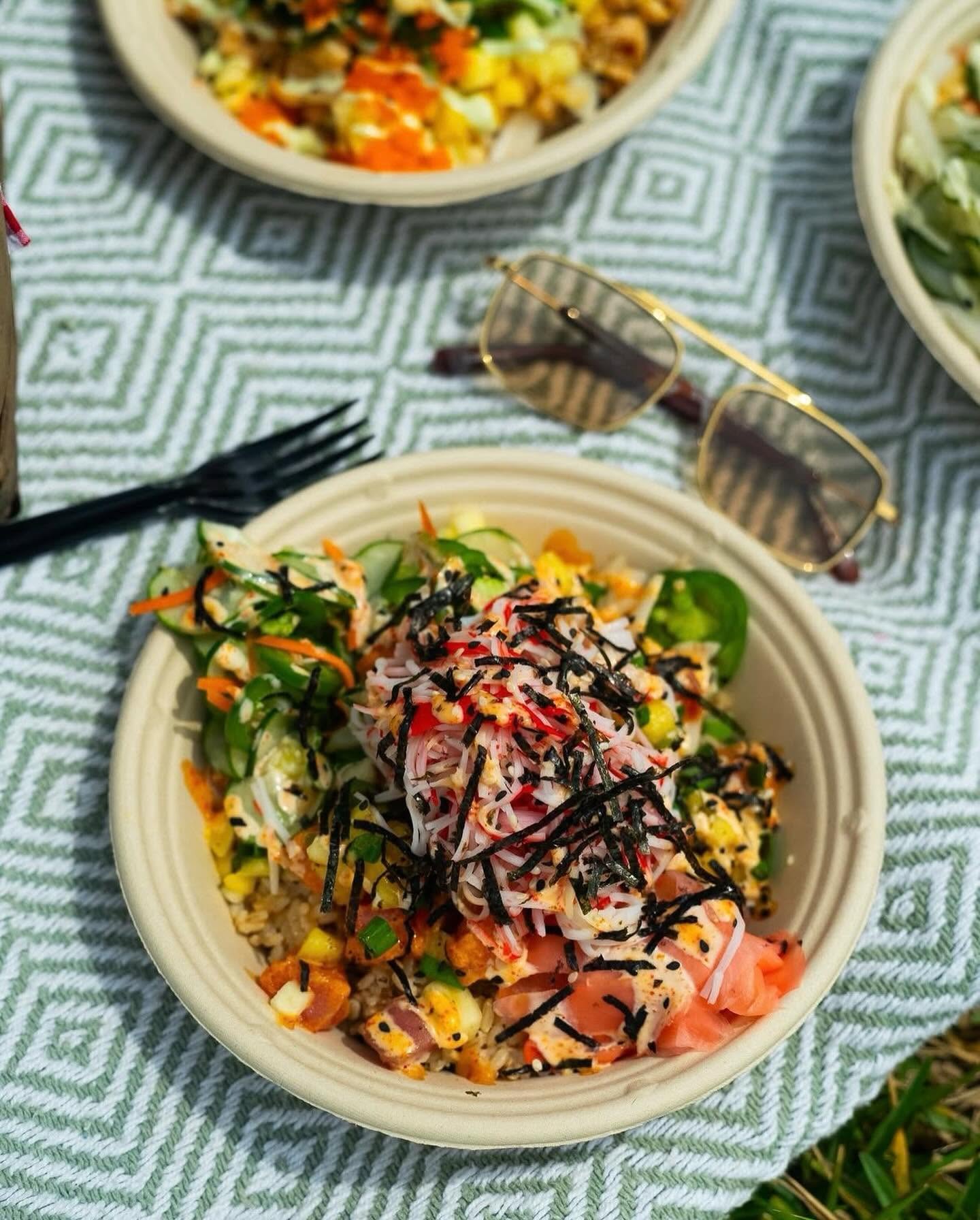 Colorful Island Fin Poké bowl loaded with premium toppings for Topping Tuesday at Beachwalk