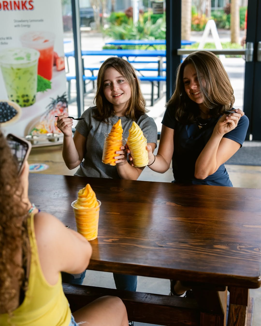 Guests enjoying Dole Soft Serve® at Island Fin Poké Co. Beachwalk